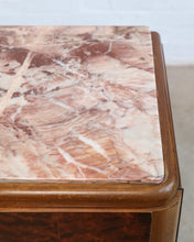 Load image into Gallery viewer, Close-up of a wooden side table featuring a pinkish-brown and cream veined marble top with rounded corners and a polished medium-brown wood frame.