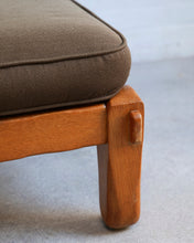 Load image into Gallery viewer, Oak framed footstool with a sprung base and brown cotton mix cushion