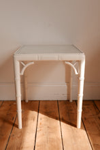 Load image into Gallery viewer, vintage white faux bamboo and cane side table / coffee table in the style of the chippindale models