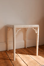 Load image into Gallery viewer, vintage white faux bamboo and cane side table / coffee table in the style of the chippindale models