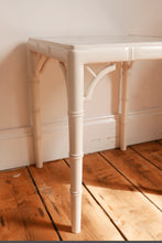 Load image into Gallery viewer, vintage white faux bamboo and cane side table / coffee table in the style of the chippindale models