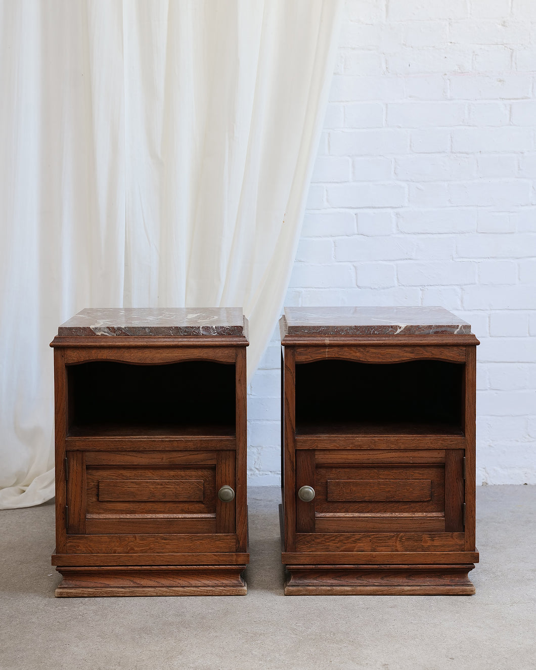 A Pair of 1950's Oak Bedside Tables