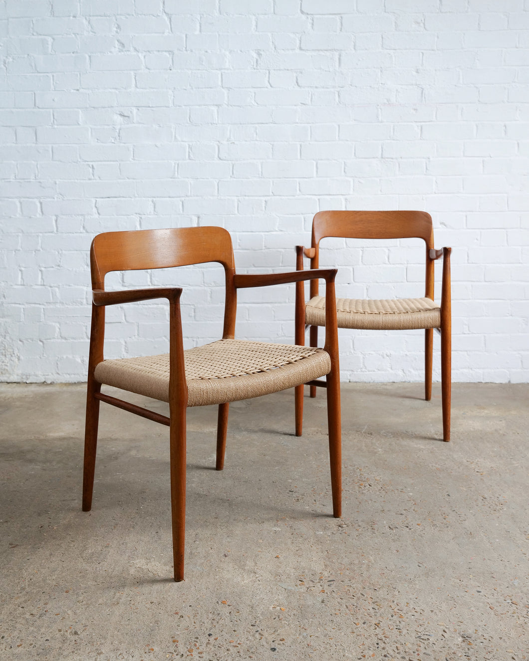 Niels O Moller carver dining chairs with paperboard seats 