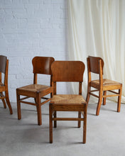 Load image into Gallery viewer, set of six art deco dining chairs in wood with rush seat pads ideal in a kitchen antique 
