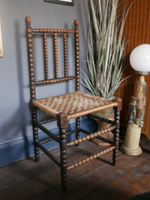 Load image into Gallery viewer, Early 19th Century Bobbin Turned Chair With Woven Seat
