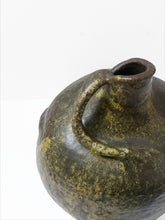 Load image into Gallery viewer, Vintage Stoneware Water Jug for sale. Urn like shape  with abstract detailed handle and a mottled matt glaze with . 
