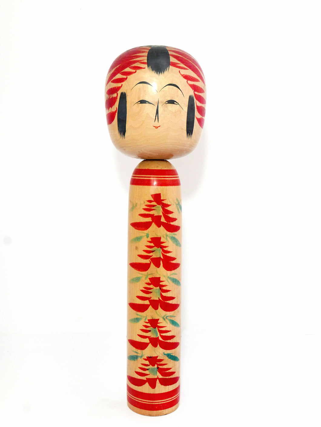 Large wooden Japenese Kokeshi doll for sale. A warm smiling face with hand painted flowers on her body with Japanese script on the base. 