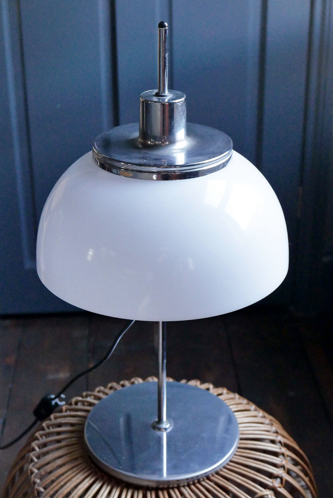 Mid Century Vintage Retro table lamp made in the 1970s by Meblo, Yugoslavia and designed by Italian designer Harvey Guzzini. Made with Chrome and a White Perspex Shade this is a perfect piece for a mid Century Modern Interior 